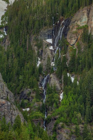 WATERFALLS AND GREEN TREES